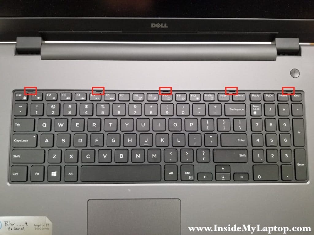 Five latches securing keyboard