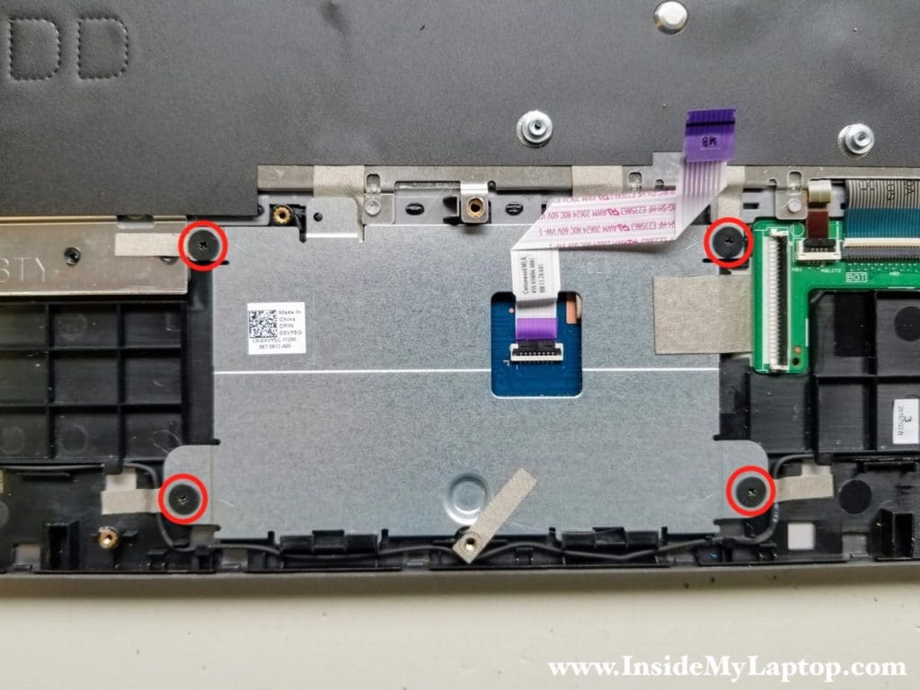 Remove screws from touchpad mounting bracket