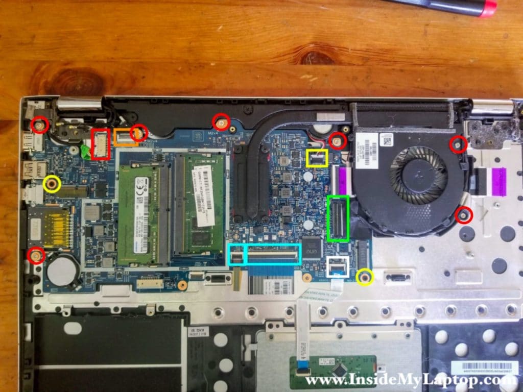 Disconnect motherboard cables and remove screws