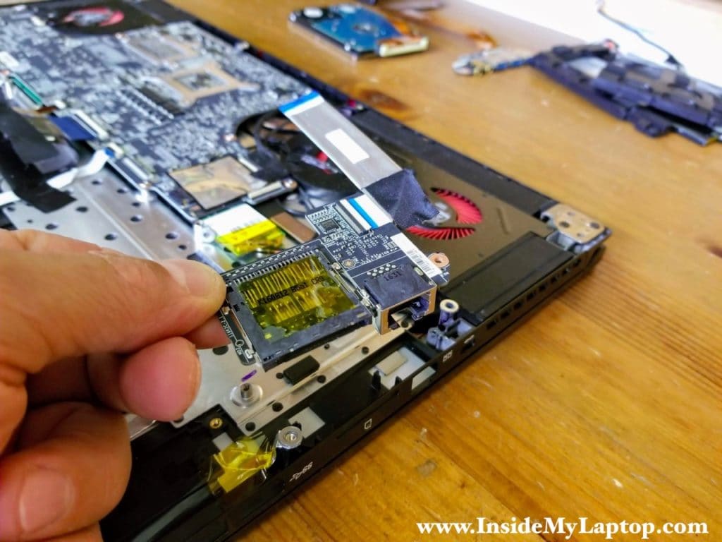 Remove the LAN/SD card reader board.