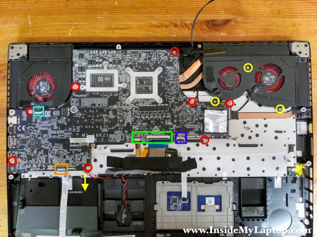 Remove all screws securing the motherboard and disconnect all cables.