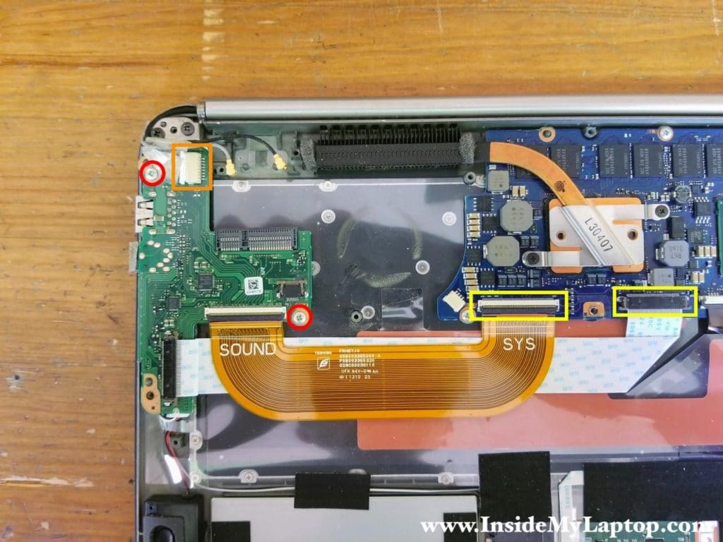 Remove two screws from the USB audio board and disconnect all cables.