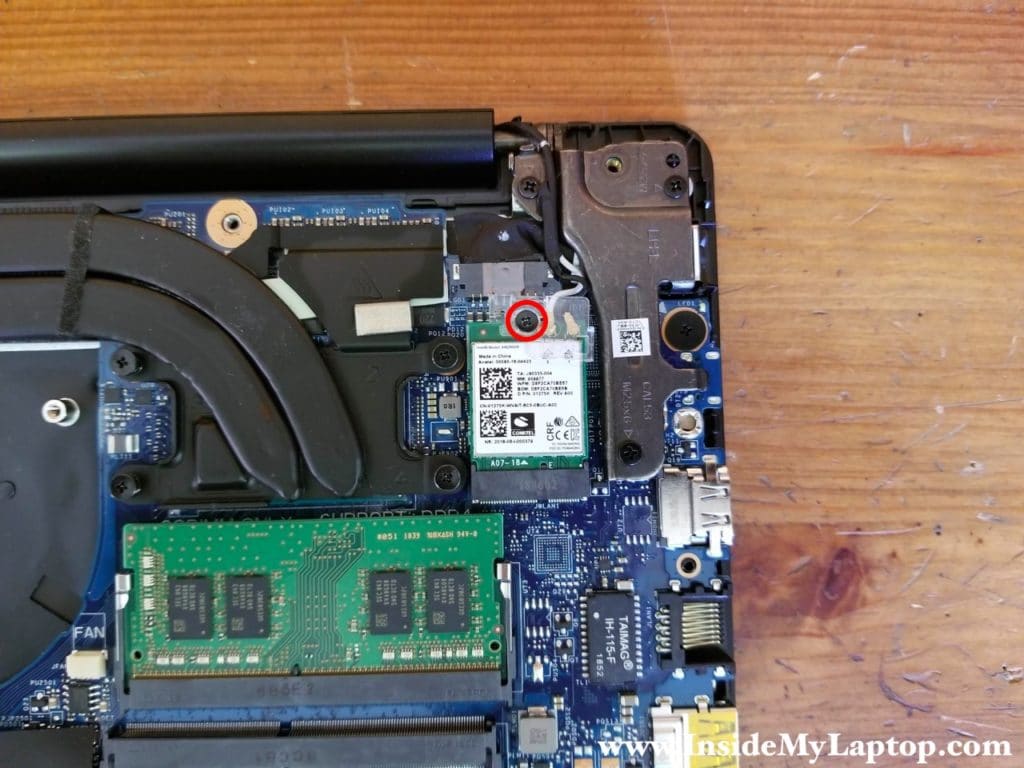 Remove one screw from the wireless card and remove the plastic cover from antenna cables.