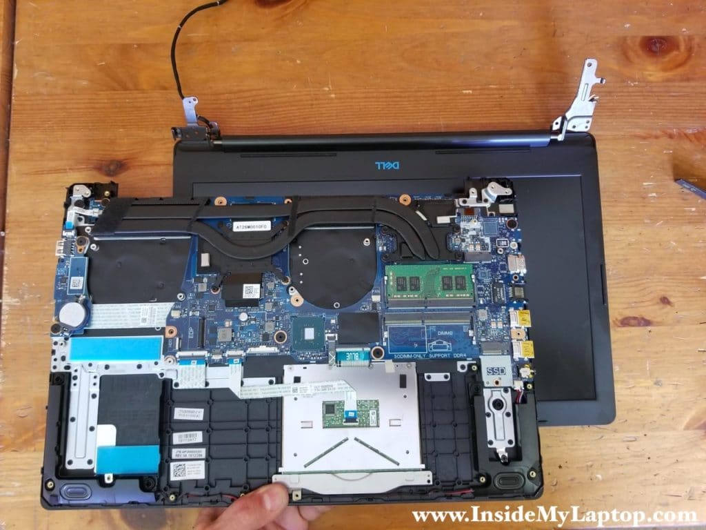 Now you can separate the palmrest assembly from the display panel.