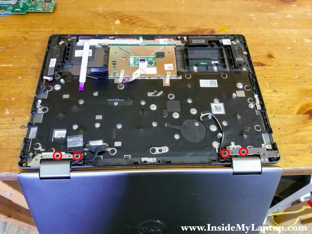 Remove screws from the display hinges.