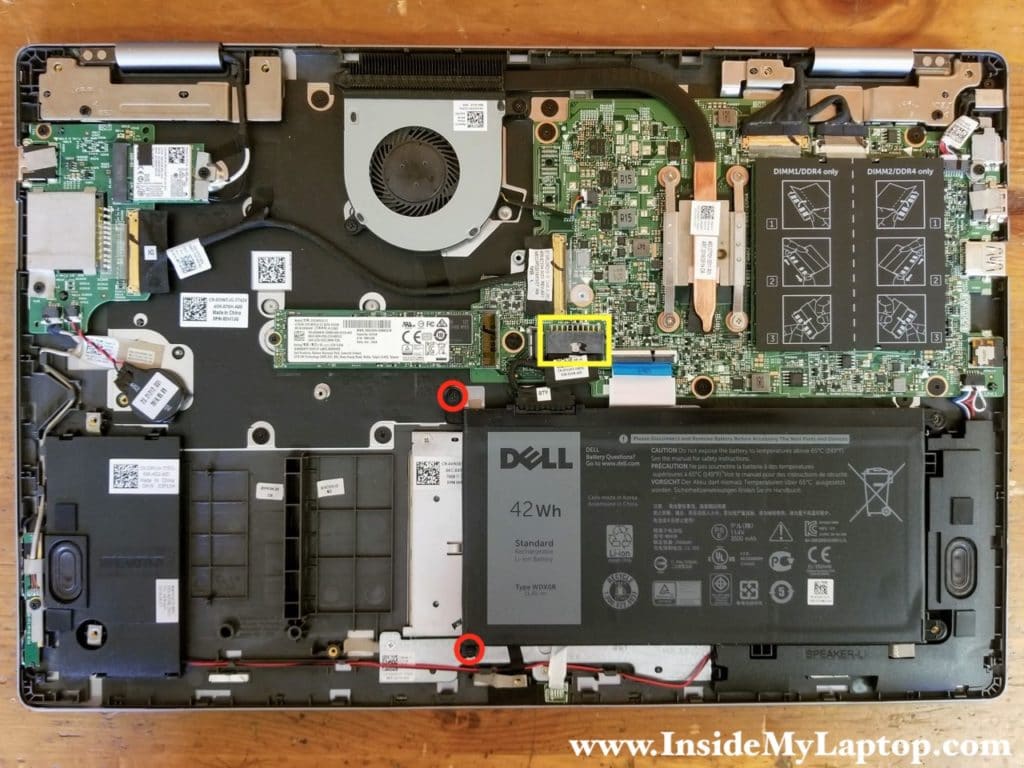 Remove two screw securing the battery on the left side. Disconnect the battery cable from the motherboard.