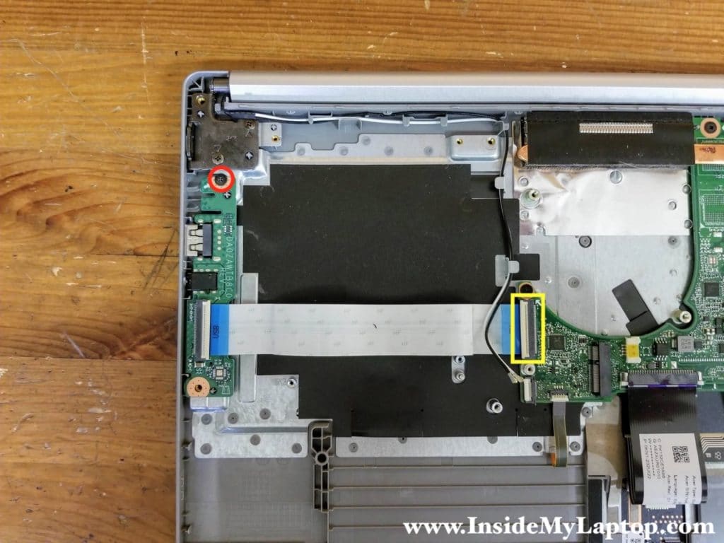 Remove one screw securing the USB audio jack board. Disconnect the I/O cable from the motherboard.