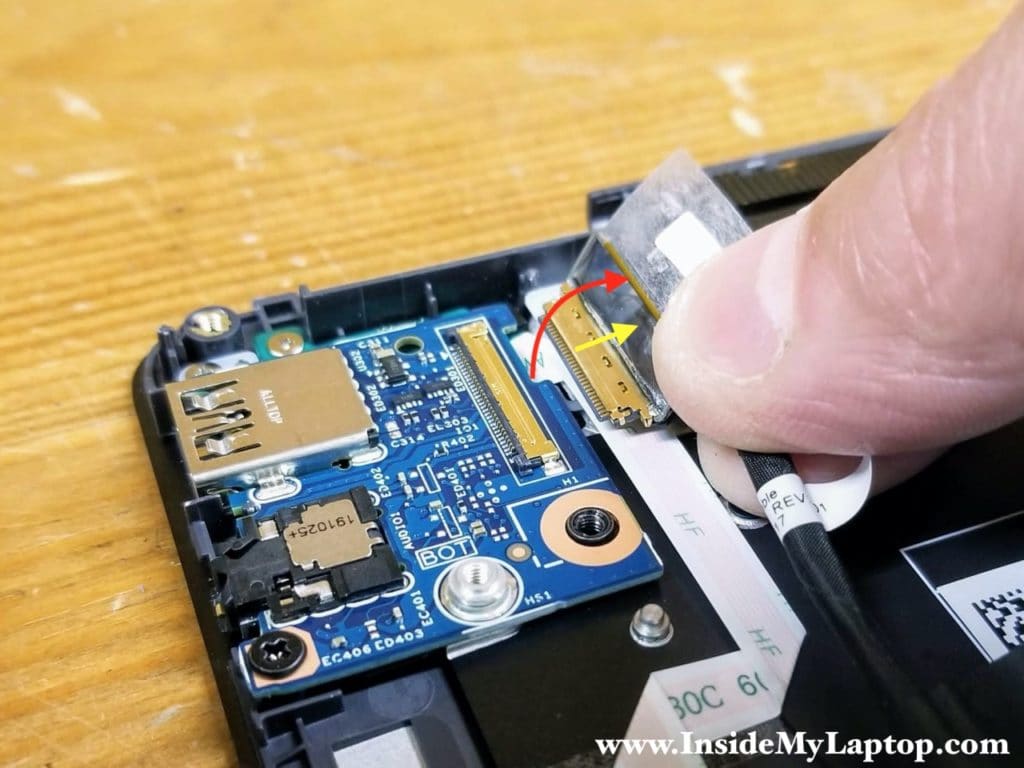 Here's how to disconnect the I/O cable from the USB audio board.