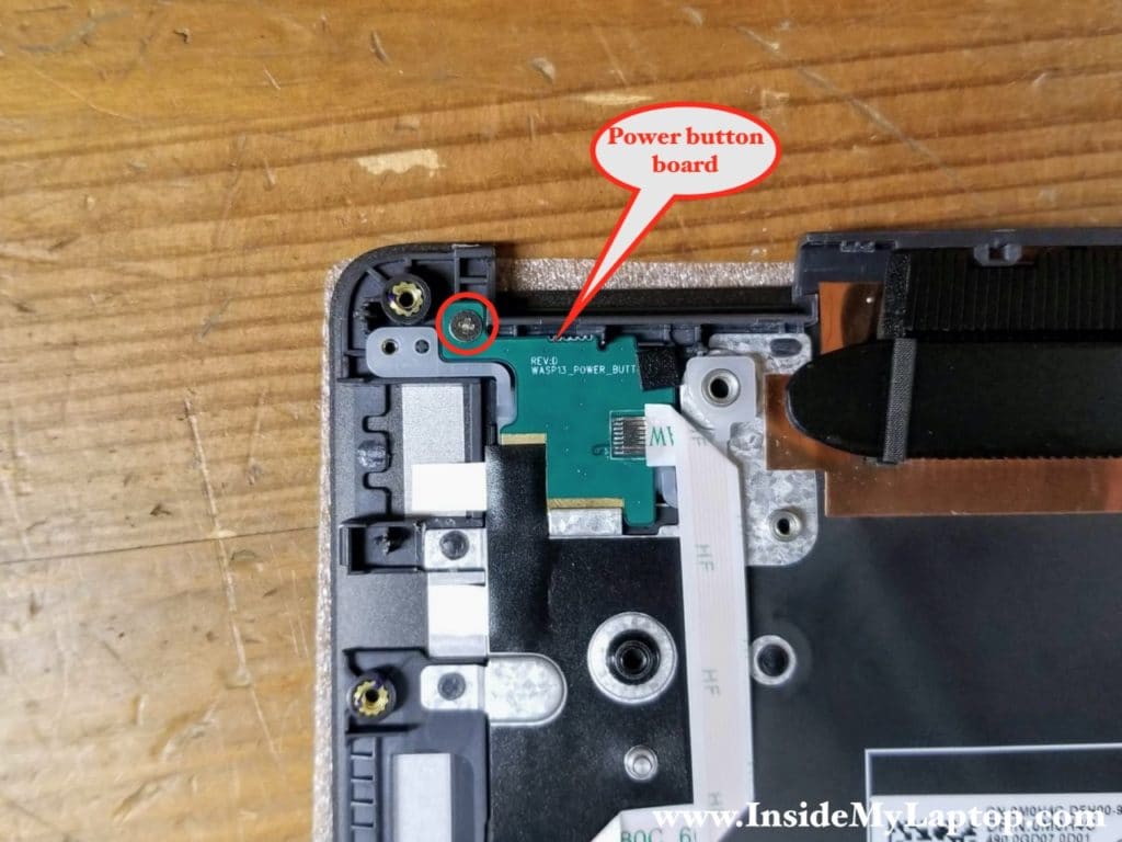 The power button located on a separate board and can be easily removed and replaced.