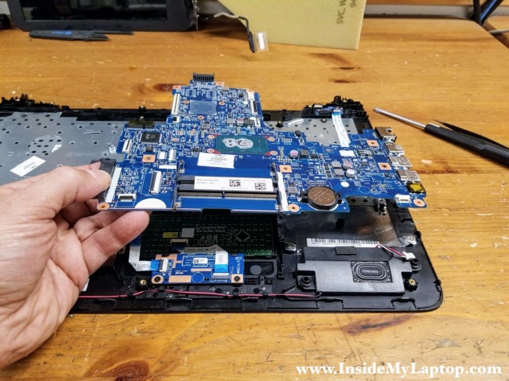 Remove the motherboard from the top case assembly.