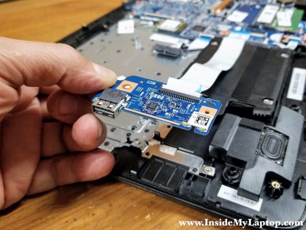 Remove the USB board with the I/O cable attached to it.