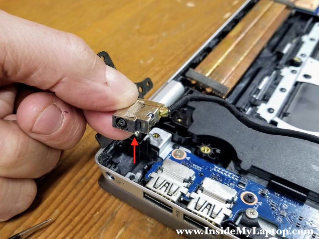 Lift up the DC jack from the case and remove it.