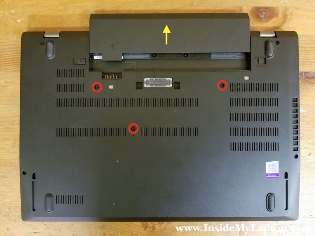 Unlock and pull out the removable battery. Loosen three captive screws securing the keyboard on the bottom