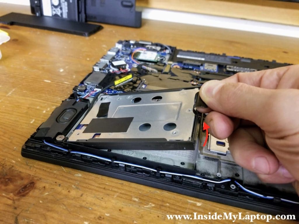 Lift up the right side of the 2.5" hard drive bracket.