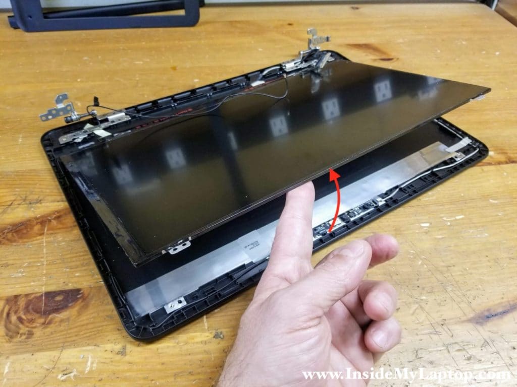 Separate the LCD screen from the display back cover and turn it upside down on the desk.