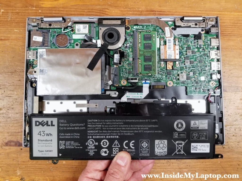 Lift up and remove the battery from the laptop.