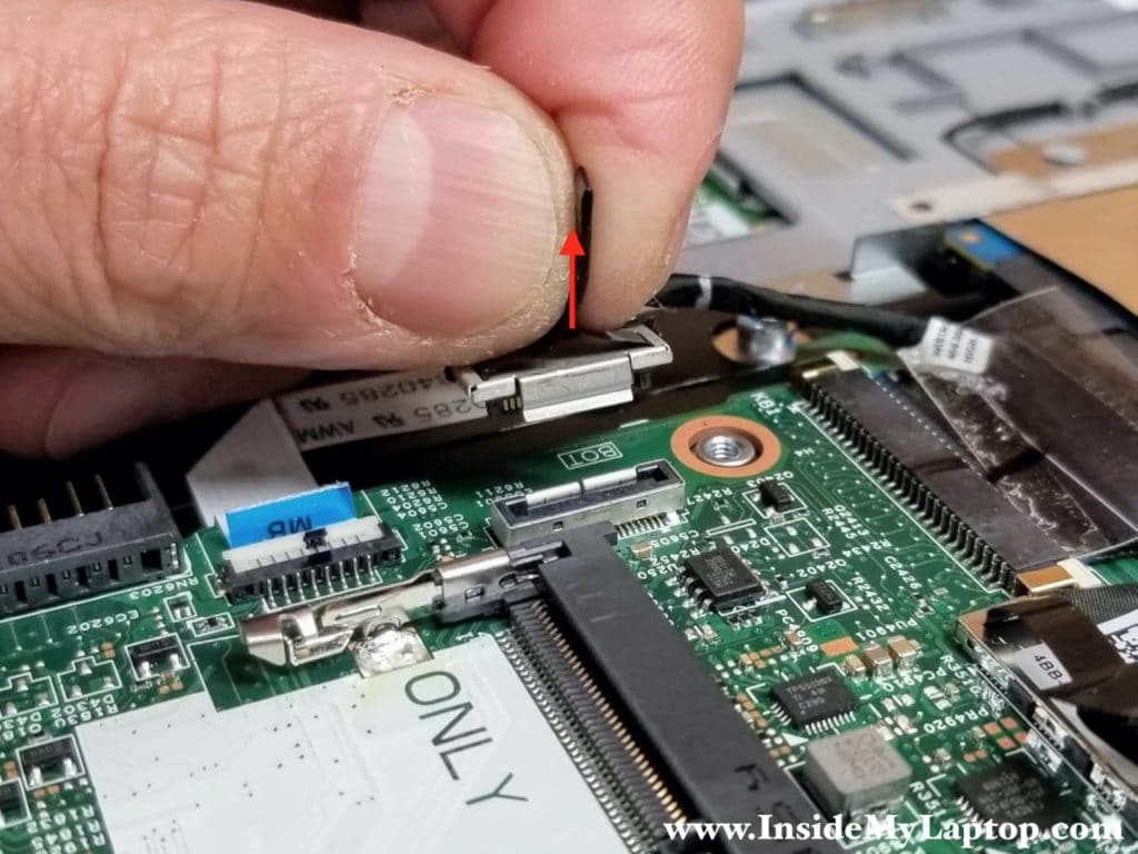 Here's how to unplug the SATA cable from the motherboard. Pull it up by the black tab located on the top of the connector.