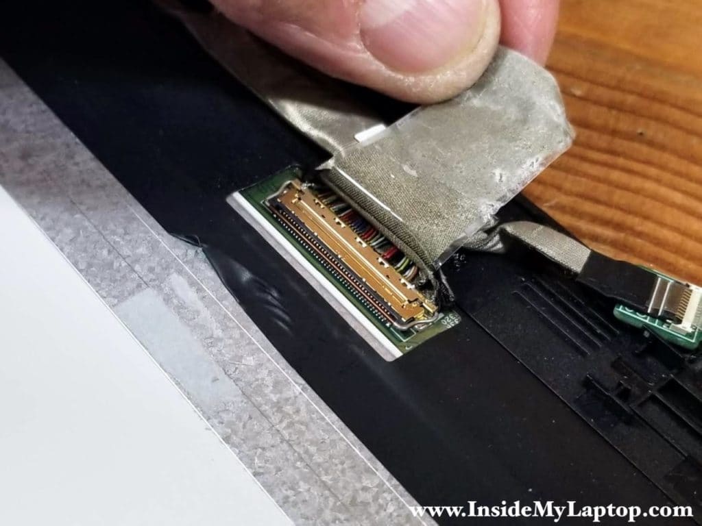 The display video cable connector has to be unlocked before removing the cable.