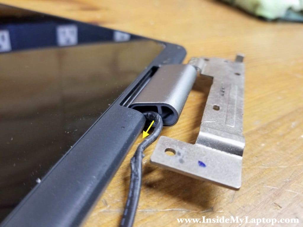 The wireless antenna cables are routed inside the hinge cover.