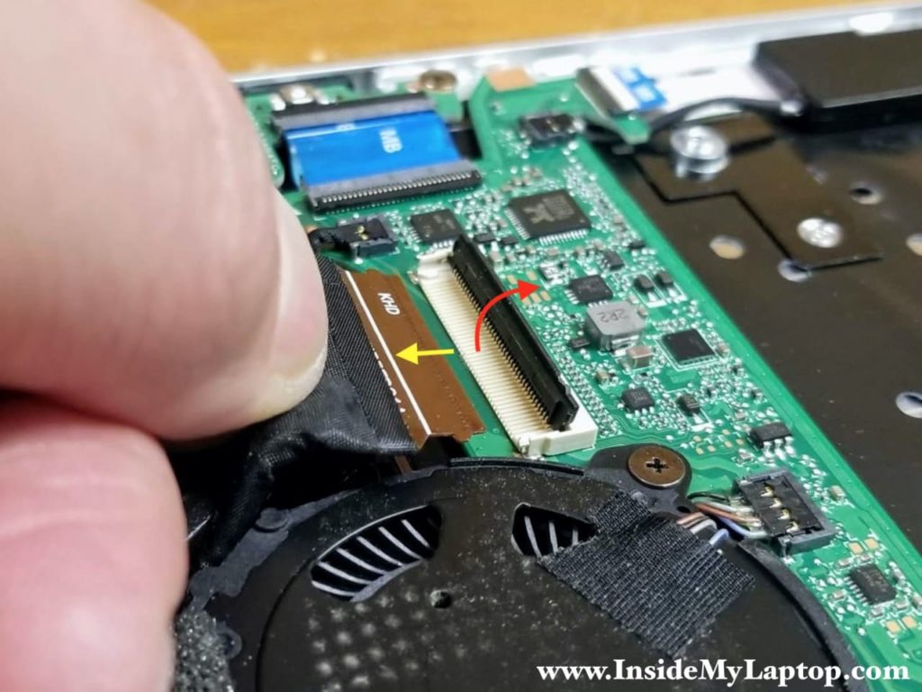 How to unlock and remove the display cable.