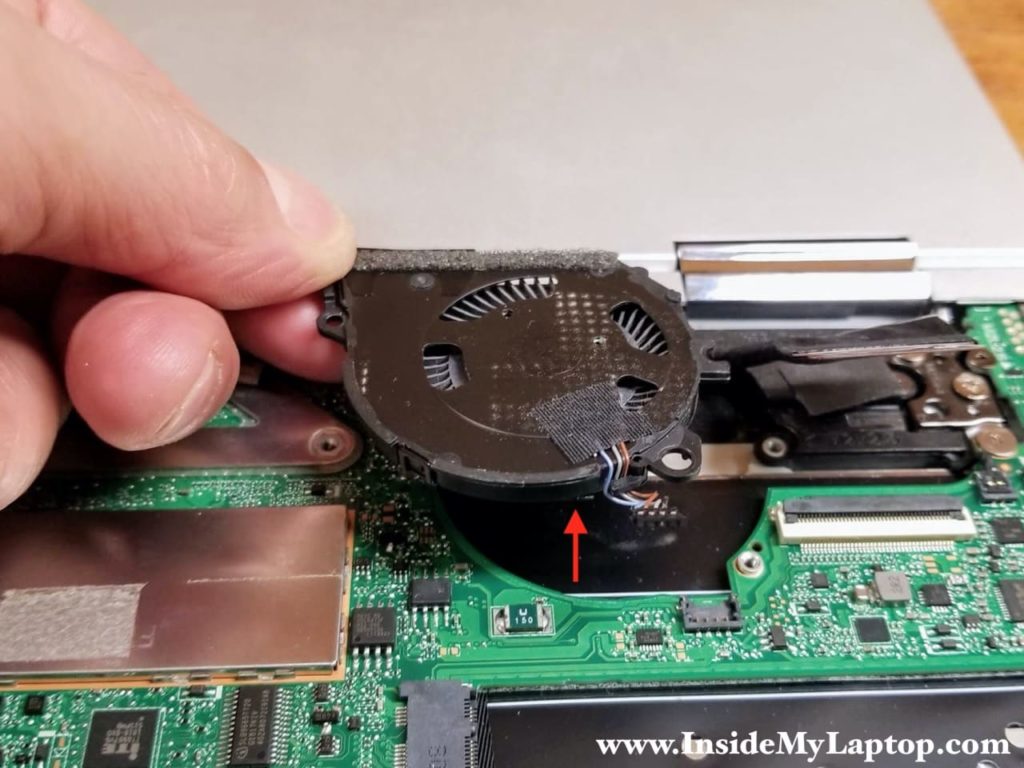 Lift up and remove the left cooling fan.