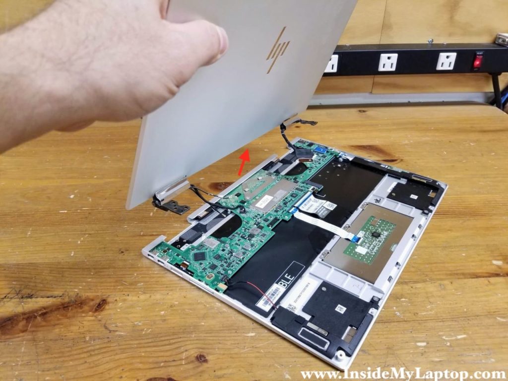 Lift up and remove the display panel.