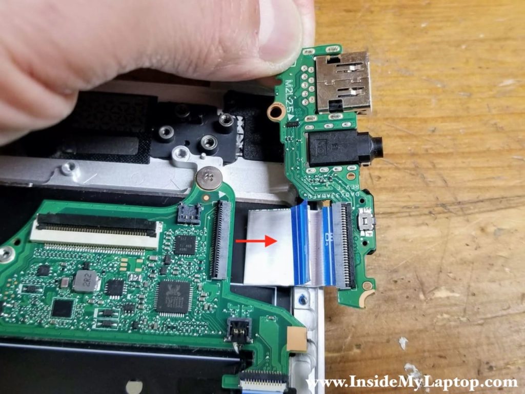 Lift up and remove the USB audio board.