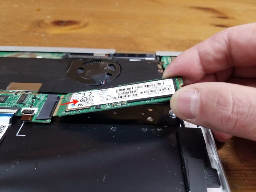 Pull the solid state drive out and remove it.