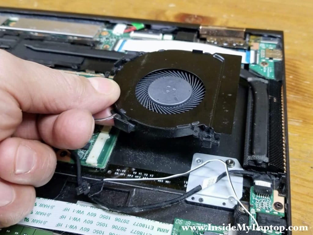 Lift up and remove the right cooling fan.