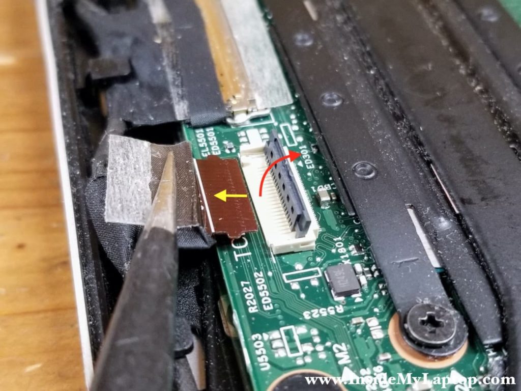 Here's how to disconnect the touchscreen board cable.