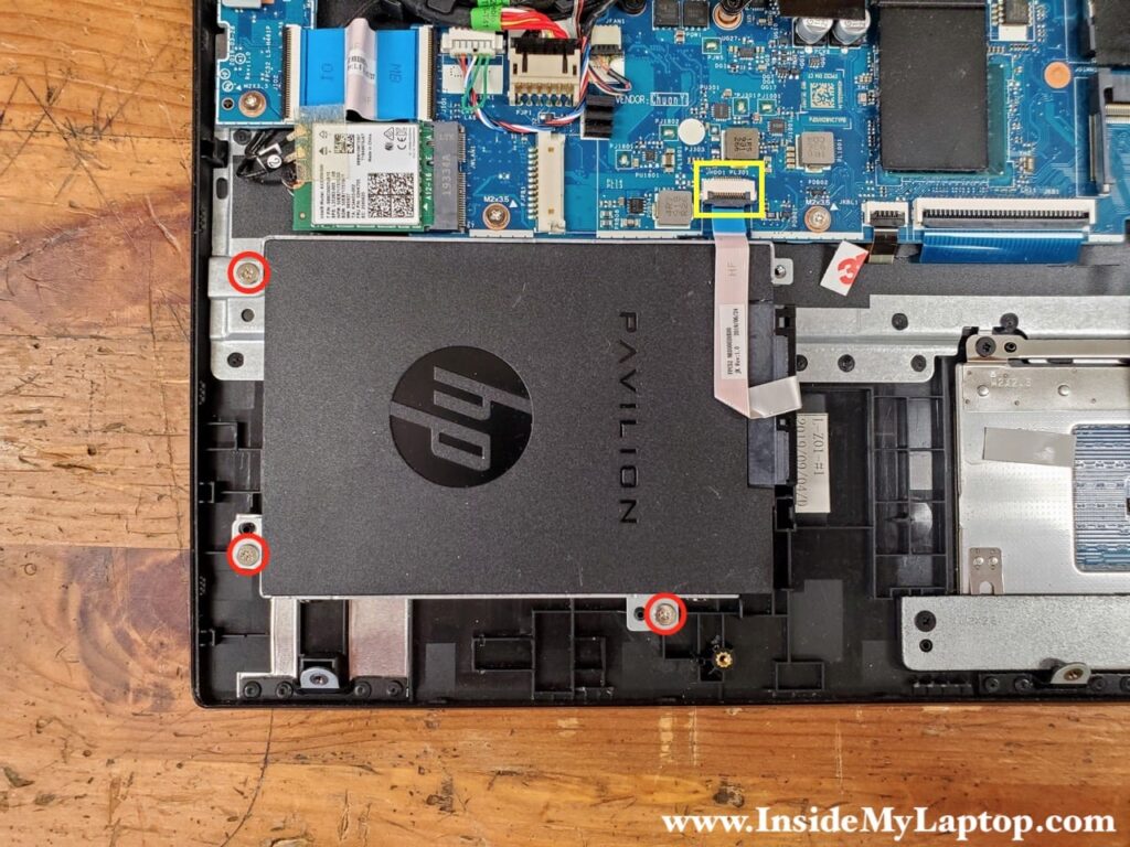 Remove three HDD screws and disconnect the SATA cable.